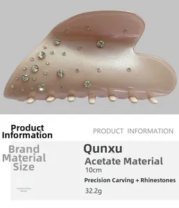 Détail de la pince à cheveux en acétate rose de 10cm avec décorations en strass