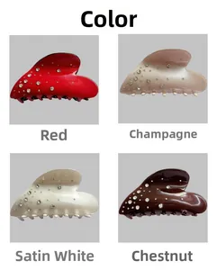 Grille détaillée de pinces à cheveux coeur en acétate rouge, champagne, blanc et marron avec strass