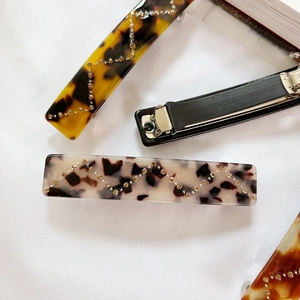French style spring hair clips with acetate marble patterns and sparkling rhinestones