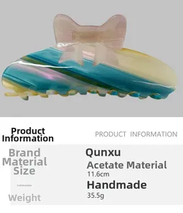 Detail of 11.6cm acetate bow hair claw with 35.5g weight and handmade gradient finish