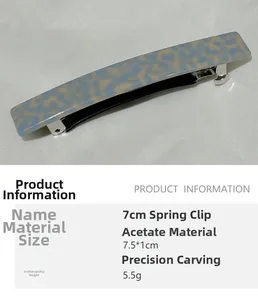 Macro shot of 7.5cm acetate spring hair clip with blue leopard pattern and dimensions
