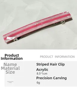 Detailed view of red and white striped acrylic barrette with silver metal spring clip