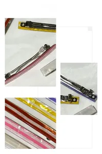 Detail view of acrylic hair clips with colorful marble texture and metal spring mechanism