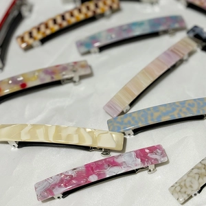 Minimalist French acetate hair barrettes with assorted tortoise and marble patterns