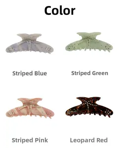 Detailed views of acetate starfish hair claws with rhinestones in four colorful stripe patterns