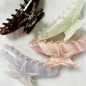French acetate hair claws with rhinestone starfish design in assorted colors