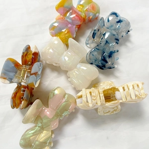 Ensemble de pinces à cheveux noeud en acétate français aux motifs marbrés variés