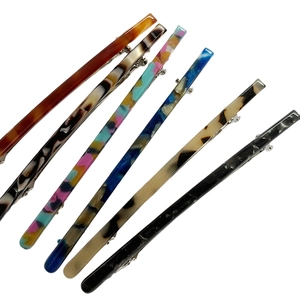 Set of six vintage acetate spring hair clips in tortoiseshell and marble patterns