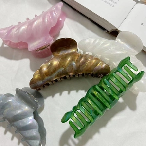 Set of five large French style resin hair claws with pearlescent finish and wave design