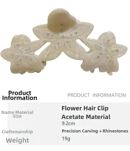 Detailed view of a 9.2cm acetate flower hair claw clip with rhinestones and marble texture