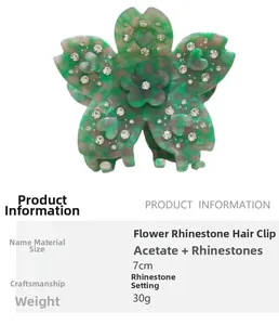 Détail de la pince à cheveux en acétate de 7cm avec fleurs, strass et motifs rose-vert