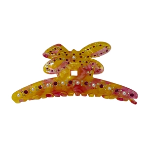 Elegante molletta per capelli a farfalla con motivo marmorizzato e strass brillanti