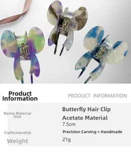 Detail of elegant acetate butterfly hair clips with marble texture and dimensions info