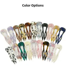 U-shaped hair pin selection in diverse acetate patterns like marble and tortoiseshell