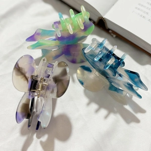 Elegant butterfly hair claw clips in marbled acetate finish for women hairstyles