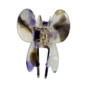 Elegant butterfly acetate hair claw clip with purple marble pattern on white background