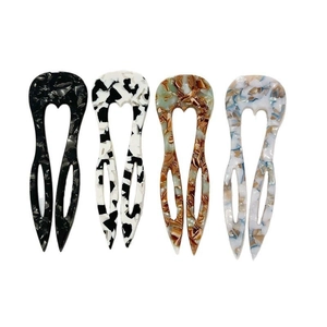 Set of four tortoiseshell and marble acetate U-shaped hair pins for elegant styling