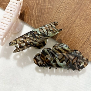 Ensemble de pinces à cheveux élégantes en acétate avec texture marbrée et finitions roses