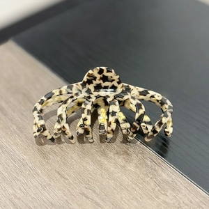 Large acetate hair claw clip with star pattern and octopus claw design for thick hair