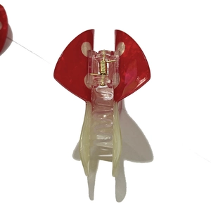 Pince à cheveux champignon rouge à pois blancs et ressort doré pour femmes