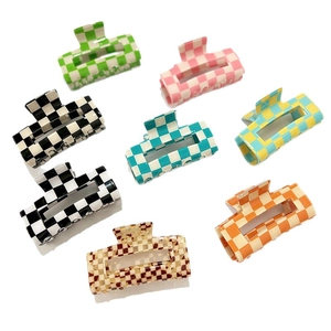 Set of eight colorful checkerboard rectangle hair claw clips in various vibrant patterns