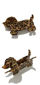 Detail view of leopard print dachshund hair claw clip showing side and open angles