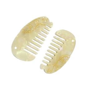 Set di pettini per capelli in acetato crema marmorizzato con eleganti motivi a foglia d'oro