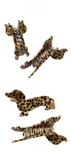 Detail view of leopard print dachshund hair claw clip with sturdy metal spring mechanism