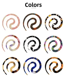 Close-up of spiral hair pins in nine patterns like tortoiseshell and marble acetate