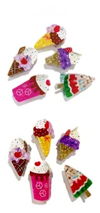Detailed tile display of acrylic summer dessert hair clips with ice cream and fruit shapes