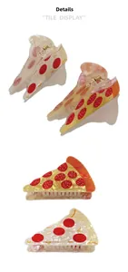 Detail showing creative pizza hair claw clips with acetate finish and metal spring buckle