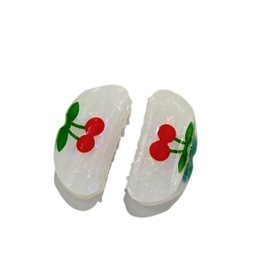 Semicircle cherry hair claw clips in translucent white resin with glossy pearl finish