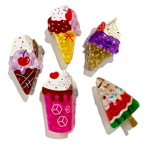 Colorful acetate hair clips in dessert shapes like ice cream cones and watermelon popsicles