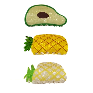 French style acetate fruit hair claws featuring avocado and pineapple designs