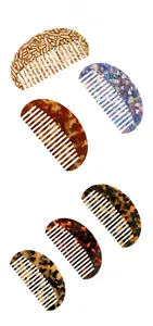 Detail of six acetate hair combs with tortoiseshell and marble patterns in tile display