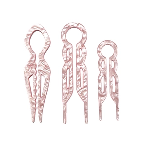 Three-piece pink marbled acetate U-shaped hair pins with elegant French wavy design