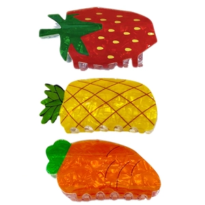 Three-piece set of fruit-shaped hair claws featuring strawberry pineapple and carrot designs