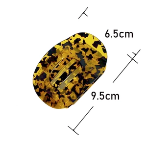 French leopard print acetate hair claw clip with dimensions 9.5cm by 6.5cm