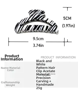 Detail view of black and white zebra pattern acetate hair claw clip with size dimensions