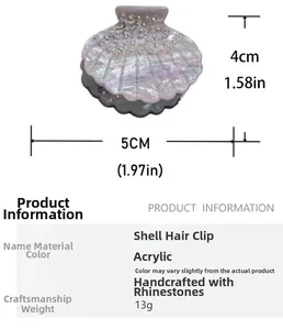 Macro view of shell-shaped acrylic hair claw with pink-purple gradient and rhinestones
