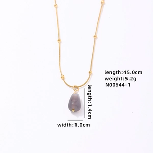 Detailed view of grey teardrop natural stone pendant with dimensions on gold chain