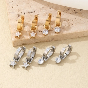 Minimalist gold and silver star and circle drop earrings with cubic zirconia on stones