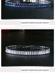 Detail view of emerald-cut blue and white zircon tennis bracelets on black surface