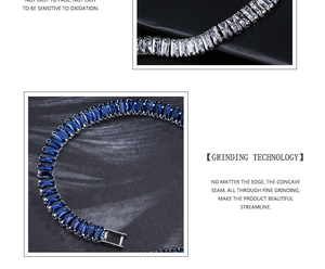 Detail of emerald cut zircon tennis bracelet featuring deep blue and clear white stones