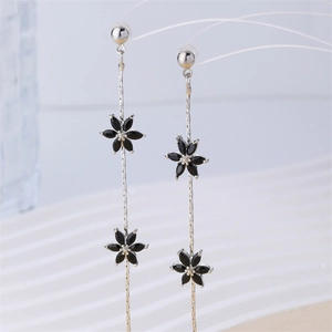Elegant long silver tassel earrings with black zircon flower accents for women