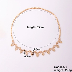 Detailed view of gold multi-layer leaf necklace with dimensions and leaf pattern