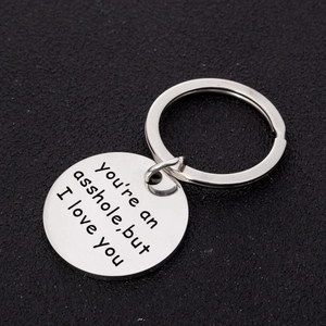 Engraved stainless steel keychain with humorous text and polished silver finish