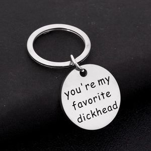 Custom silver stainless steel keychain featuring a humorous favorite dickhead engraving