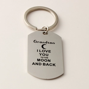 Stainless steel keychain with moon design and I love you to the moon and back engraving