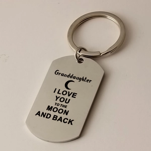 Detail of Granddaughter stainless steel keychain with engraved emotional moon message